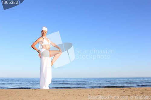 Image of  woman relaxing on the beach