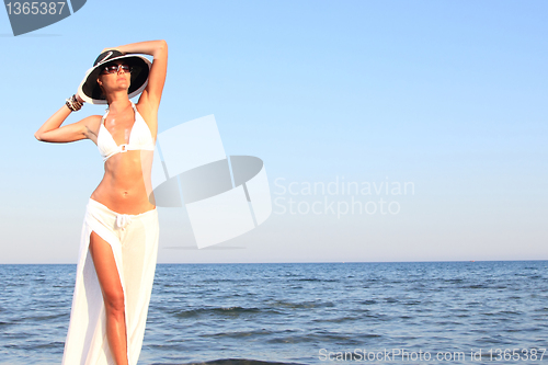 Image of  woman relaxing on the beach