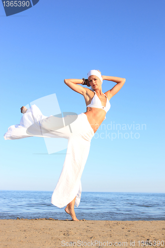 Image of  woman relaxing on the beach