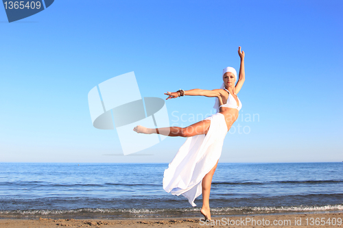 Image of  woman relaxing on the beach