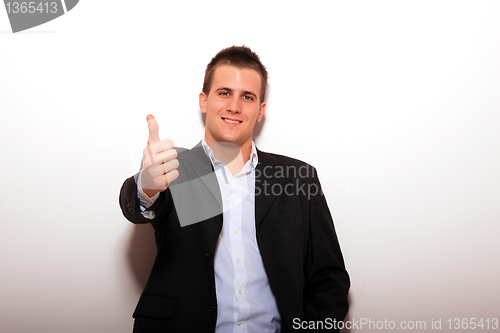 Image of Cool businessman standing 