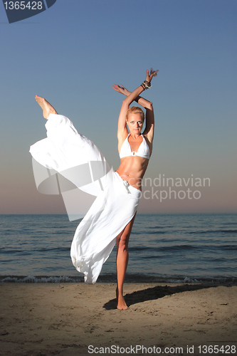 Image of  woman relaxing on the beach