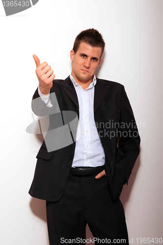 Image of Cool businessman standing 