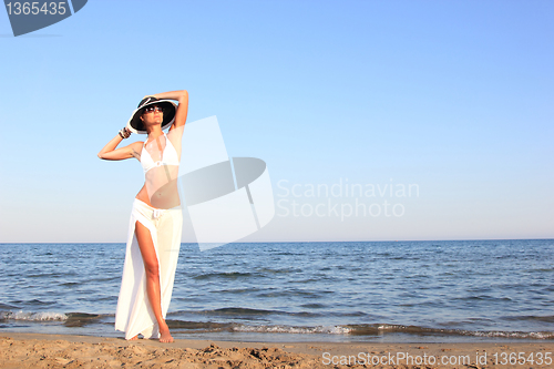 Image of  woman relaxing on the beach