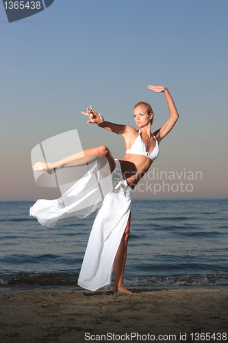 Image of  woman relaxing on the beach