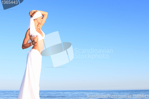 Image of  woman relaxing on the beach