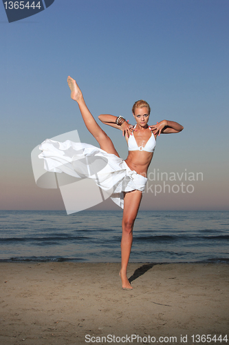 Image of  woman relaxing on the beach