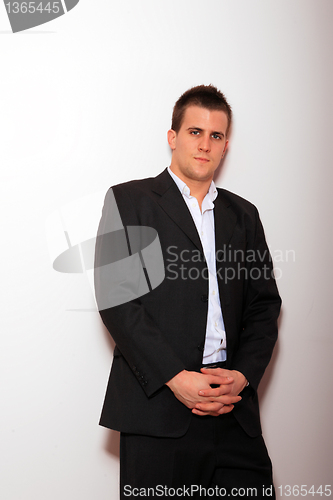 Image of Cool businessman standing 