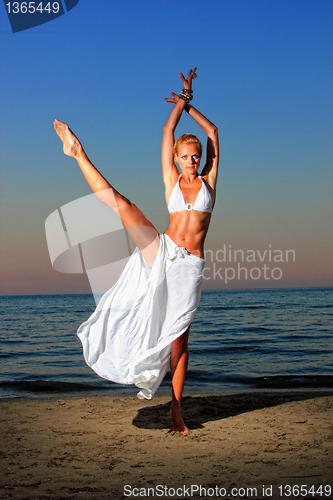 Image of  woman relaxing on the beach