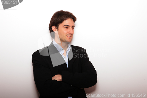 Image of Cool businessman standing 