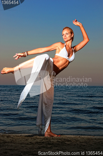 Image of  woman relaxing on the beach