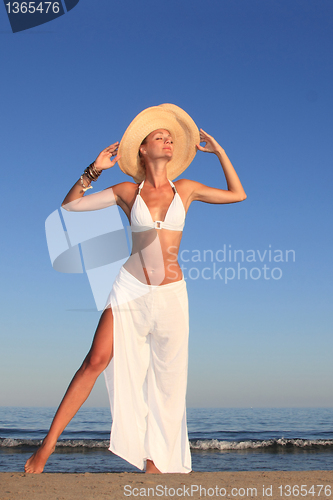 Image of  woman relaxing on the beach