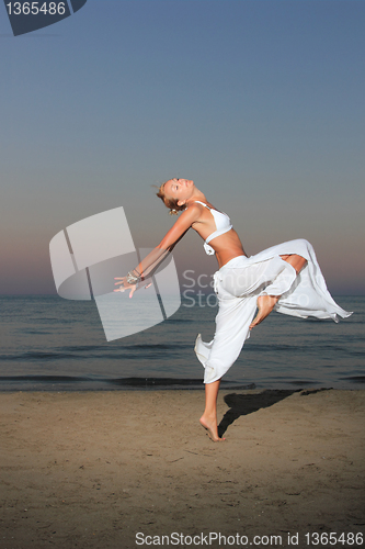 Image of  woman relaxing on the beach