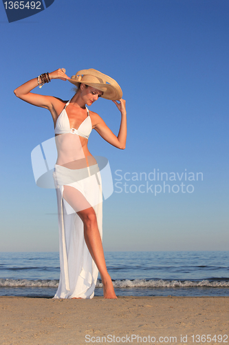 Image of  woman relaxing on the beach