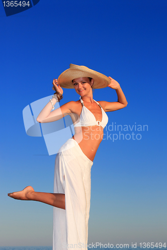 Image of  woman relaxing on the beach