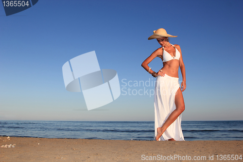 Image of  woman relaxing on the beach