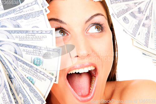 Image of Young happy woman with dollar