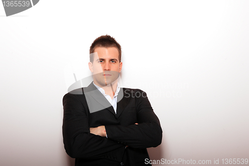 Image of Cool businessman standing 