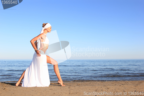 Image of  woman relaxing on the beach