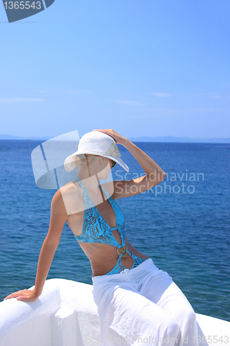 Image of  woman relaxing on the beach