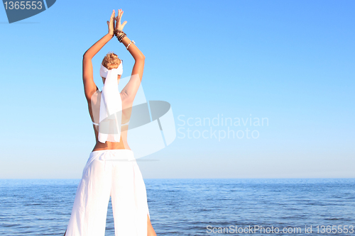 Image of  woman relaxing on the beach