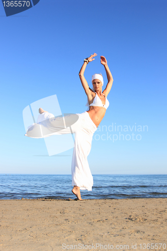 Image of  woman relaxing on the beach