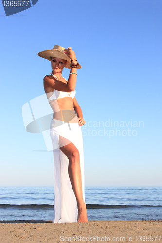 Image of  woman relaxing on the beach