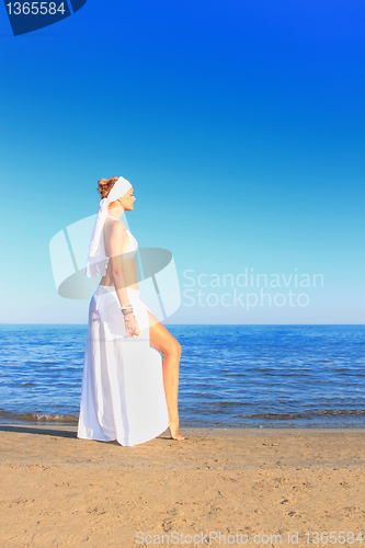 Image of  woman relaxing on the beach