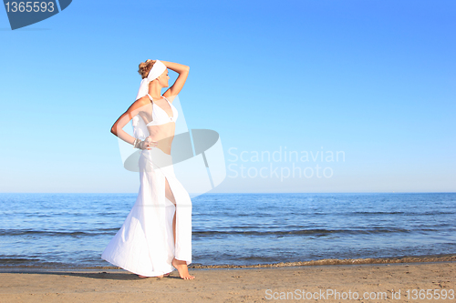 Image of  woman relaxing on the beach