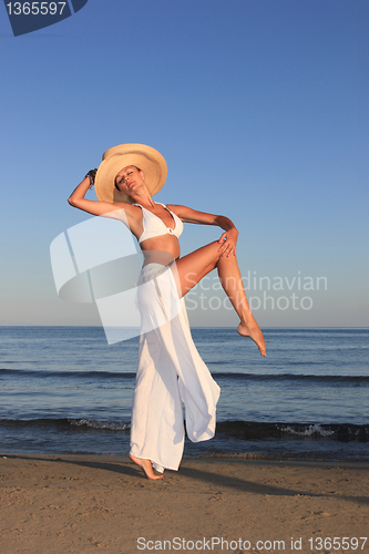 Image of  woman relaxing on the beach