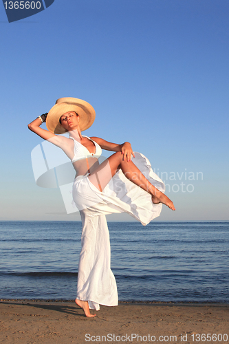 Image of  woman relaxing on the beach