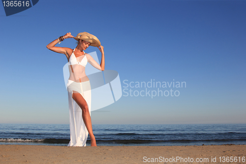 Image of  woman relaxing on the beach