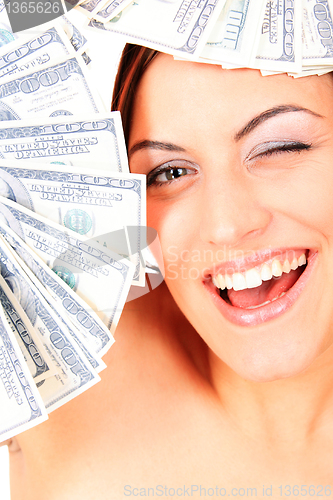Image of Young happy woman with dollar