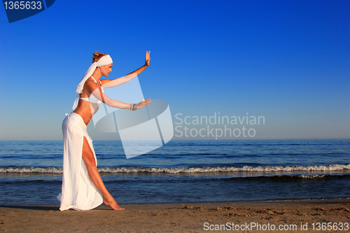 Image of  woman relaxing on the beach