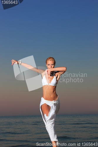 Image of  woman relaxing on the beach