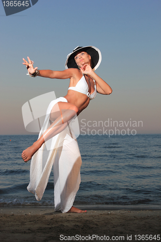 Image of  woman relaxing on the beach