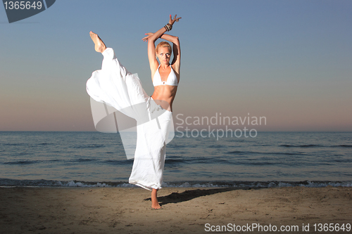 Image of  woman relaxing on the beach