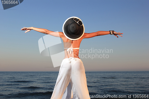 Image of  woman relaxing on the beach