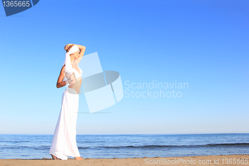 Image of  woman relaxing on the beach