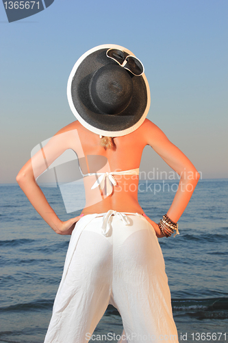 Image of  woman relaxing on the beach