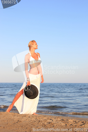 Image of  woman relaxing on the beach