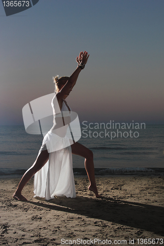 Image of  woman relaxing on the beach