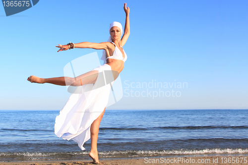 Image of  woman relaxing on the beach