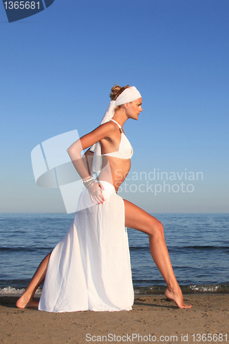 Image of  woman relaxing on the beach