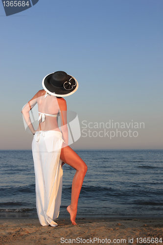 Image of  woman relaxing on the beach