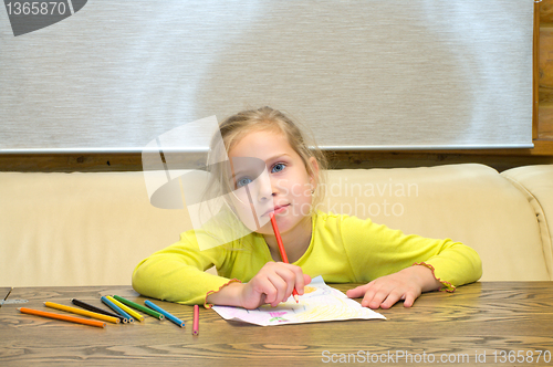 Image of Girl has thought of drawing.