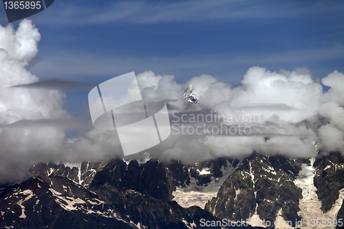 Image of High Mountains covered with clouds