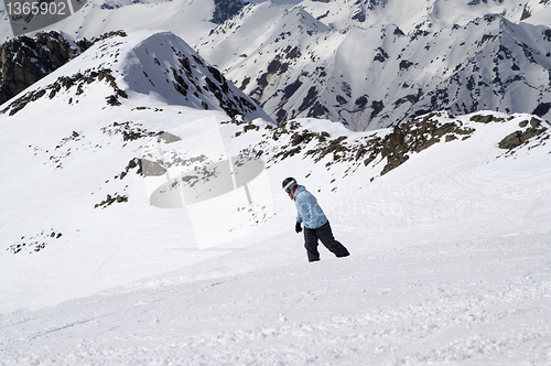 Image of Snowboarding in high mountains