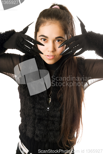 Image of Portrait of pretty young woman in gloves