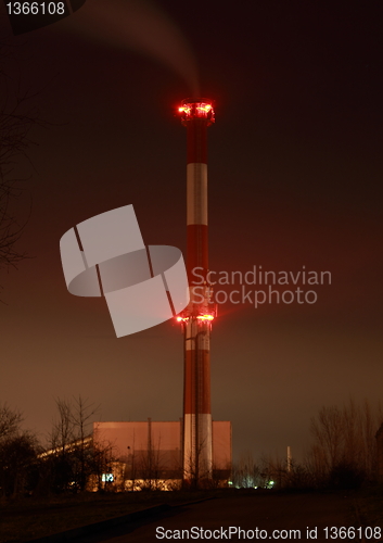 Image of Illuminated chimney at night